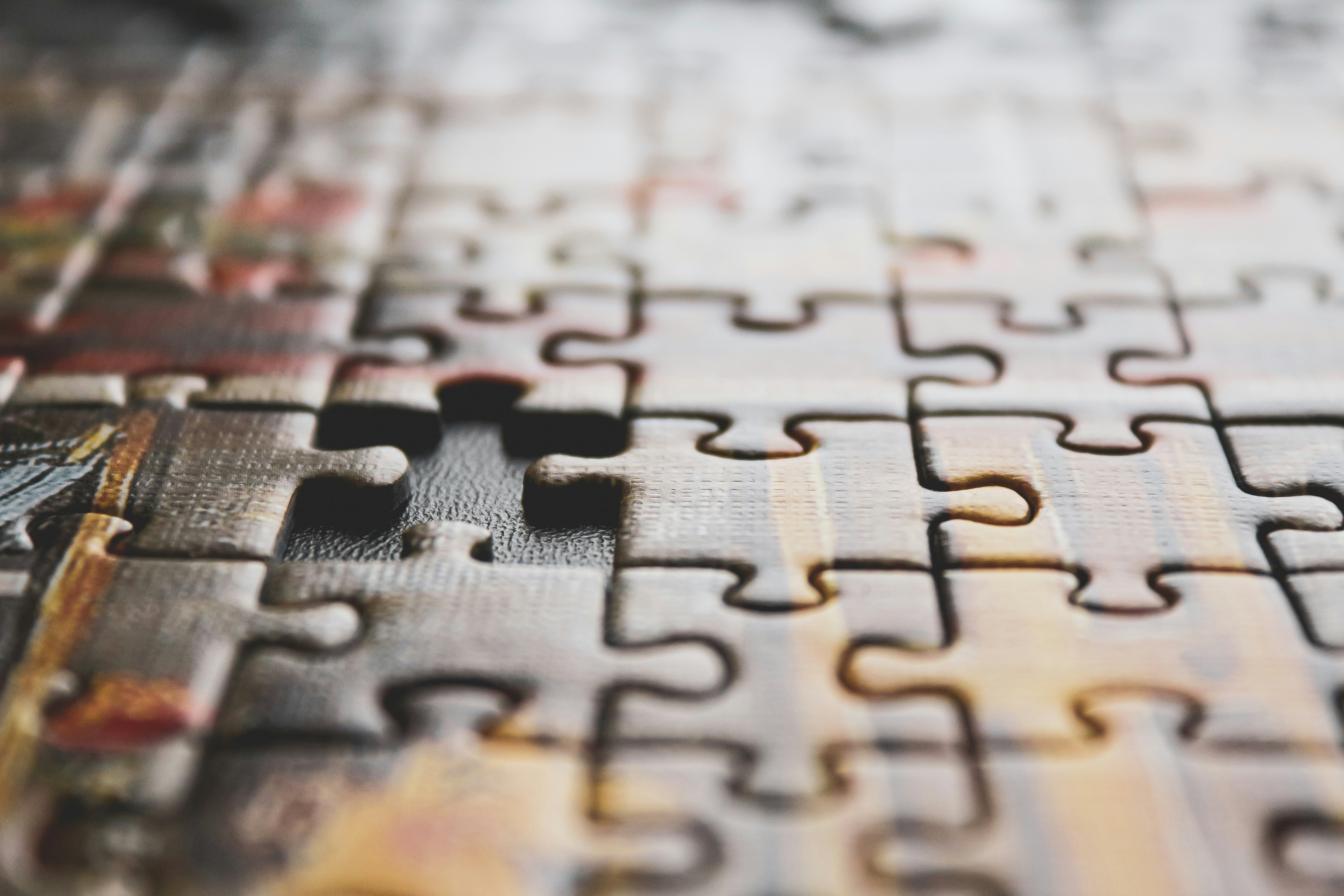 brown and black jigsaw puzzle